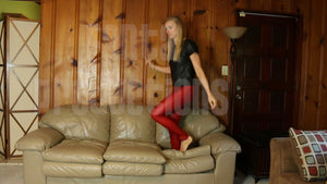 Tyler Grace Jumping on the Couch Barefoot in Leather