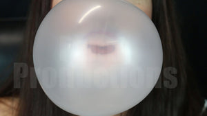 Laney Blowing Bubbles in Striped Dress Front View