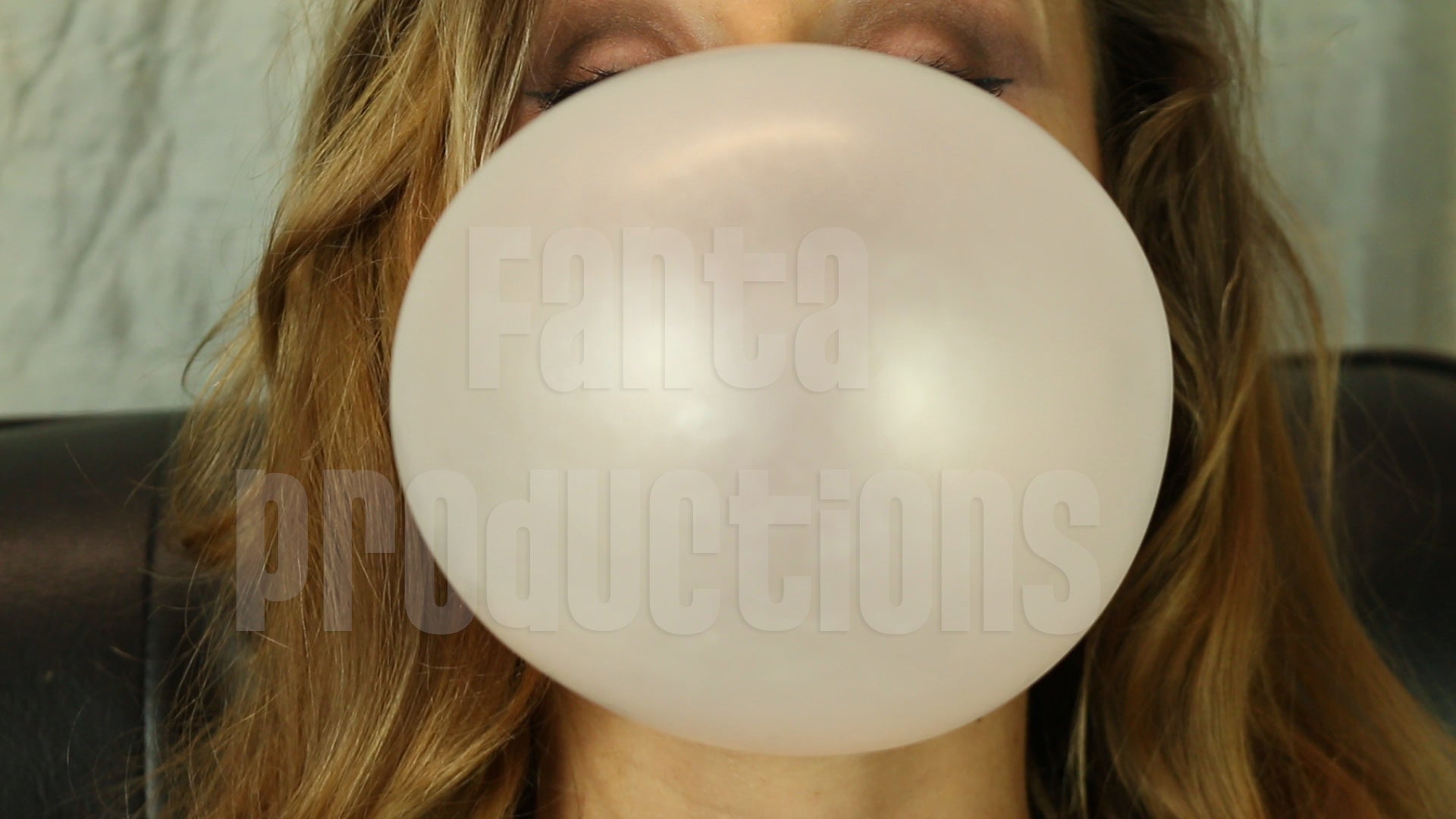 Vassanta Blowing Bubbles in Leather Outfit