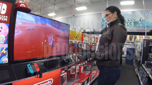 Britney Playing Nintendo in a Store